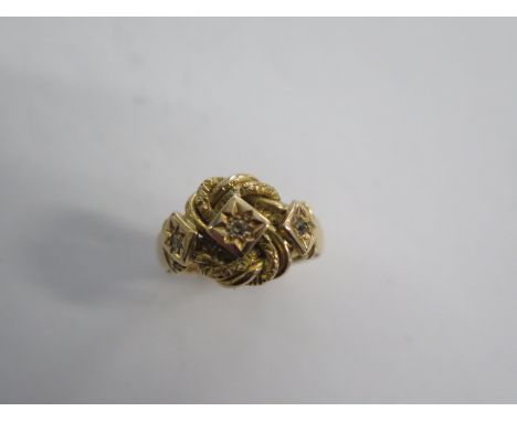 An 18ct yellow gold ring size J/K set with three small diamonds - approx weight 5.5 grams - generally good condition 