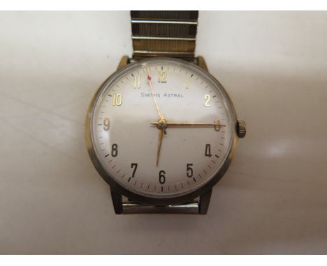 A 9ct yellow gold Smiths Astral manual wind gents presentation VICKERS 1966 Forty Year Service wristwatch on a plated sprung 
