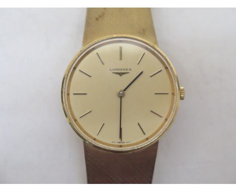 A Longines gold plated manual wind wristwatch with later added 14ct gold bracelet strap - 33mm case - approx total weight 84 