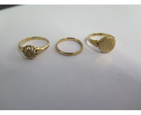 Three 18ct yellow gold rings - sizes K, O, Q - total weight approx 7.5 grams 