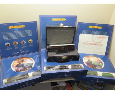 Three Hornby/Royal Doulton engines with collector plates - all boxed and a Bachmann Royal Scott Engine - all boxed, as new 