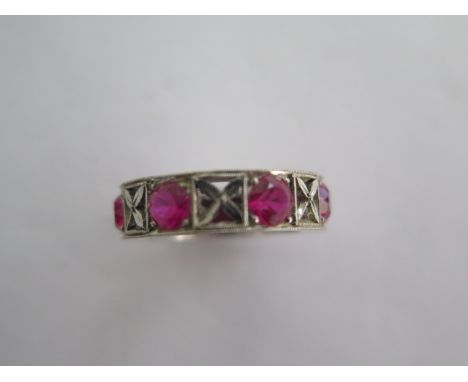 A white metal red stone ring possibly ruby - ring size K - approx weight 5.8 grams - generally good 