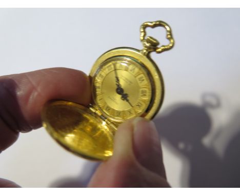 A small 18ct yellow gold Josephs manual wind Hunter type watch - 27mm case, sprung front, approx weight 21 grams - in running