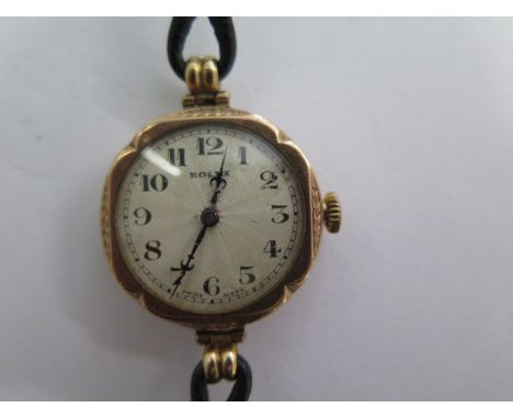 A 9ct yellow gold Rolex manual wind ladies wristwatch on a leather strap - 24mm case - not running - approx total weight 16 g