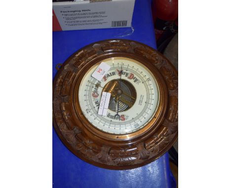 BAROMETER IN CARVED OAK FRAME, BY ALDRED &amp; SON, GREAT YARMOUTH