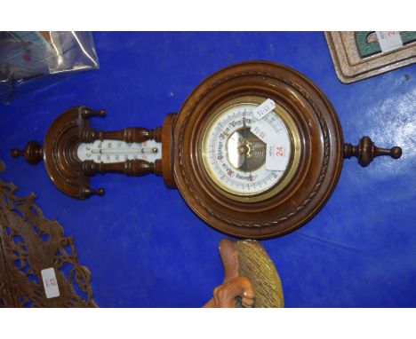 BAROMETER IN CIRCULAR MAHOGANY CASE WITH THERMOMETER ABOVE