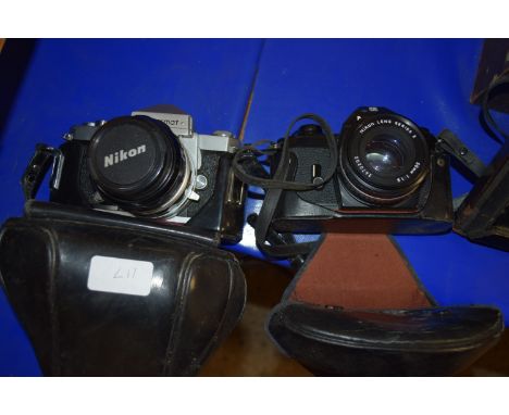 VINTAGE NIKON NIKKORMAT CASED CAMERA STAMPED FT4394072, TOGETHER WITH A VINTAGE CASED NIKON