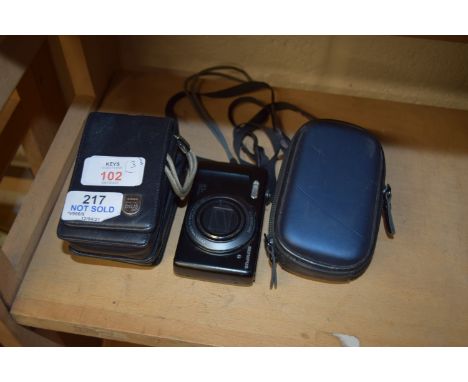 THREE CAMERAS TO INCLUDE A CANON IXUS 50 5MGPXL CAMERA TOGETHER WITH A CANON IXUS L-1 CAMERA AND A FURTHER OLYMPUS VR-340 16M