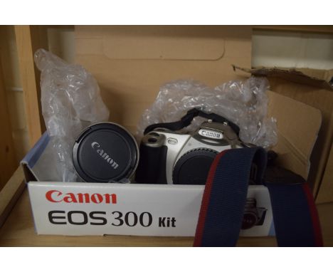 BOXED CANON E05300 KIT CAMERA IN ORIGINAL BOX PLUS A 282 19MM LENS