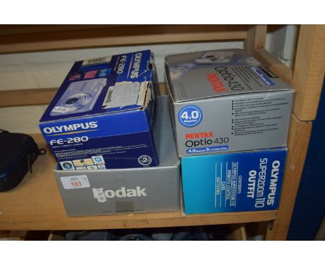 FOUR BOXED CAMERAS TO INCLUDE AN OLYMPUS FE-280 DIGITAL CAMERA, PLUS A PENTAX OPTI 430 CAMERA