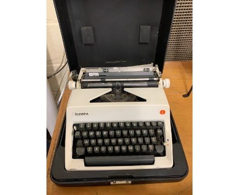 BOX CONTAINING A TYPEWRITER