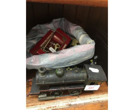 BAG OF TOY CARS AND MODEL TRAIN ENGINE