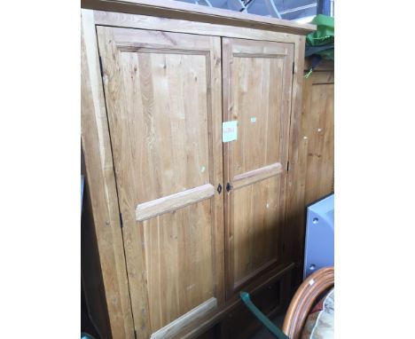 A MODERN LIGHT OAK WARDROBE