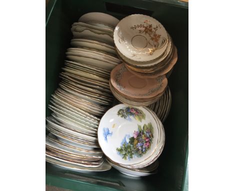 GREEN CRATE OF CHINA SAUCERS     T3