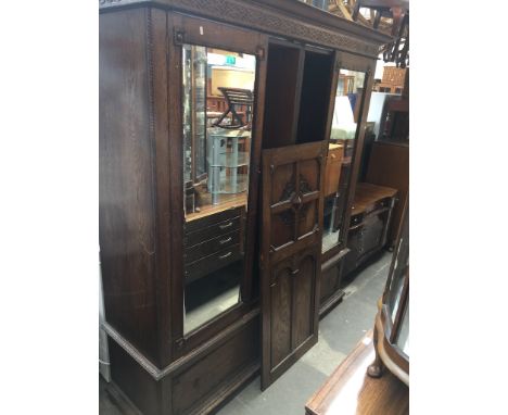AN OAK MIRROR DOOR WARDROBE WITH MOULDED RELIEF CENTRAL PANEL   H202CM W190CM D55CM