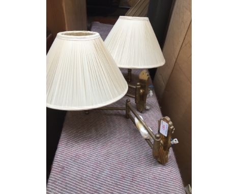 A PAIR OF BRASS WALL LIGHT FITTINGS