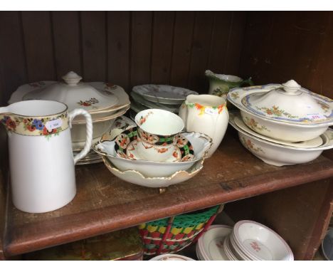 SHELF OF POTTERY
