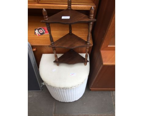 A WHITE WOVEN LINEN BASKET AND SMALL CORNER SHELF