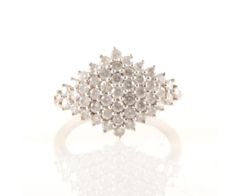 A diamond boat shape cluster ring, the forty-nine round brilliant cut diamonds set in a 9 carat yellow gold mount, approximat