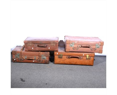 A vintage leather suitcase, and three others. (4)