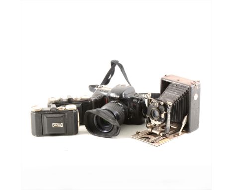 A collection of vintage folding, 35mm and box cameras, twenty to include Ziss Ikon Box-Tengor, Houghtons, Nikon F-50m, Kodak 