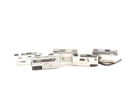 A collection of sub-miniature spy type cameras, fourteen including Minolta 16, Minolta 16MG, Minox EC, Minolta 16QT, Universa