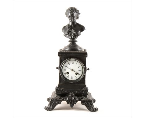 Late 19 th Century French bronzed spelter mantel clock, the case with a portrait bust pediment, and on scrolled legs, circula