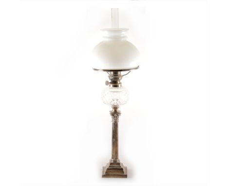 An Edwardian silver Corinthian column candlestick peg lamp, Elkington &amp; Co., Birmingham 1904, cut glass reservoir, with o