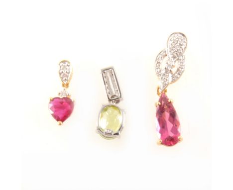 A Burmese ruby and diamond pendant, the heart shape mixed cut ruby claw set with one small round diamond above and suspended 