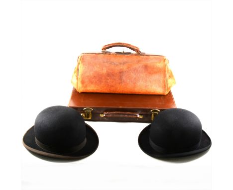 Leather attaché case, small Gladstone bag, two bowler hats, vintage clothing.