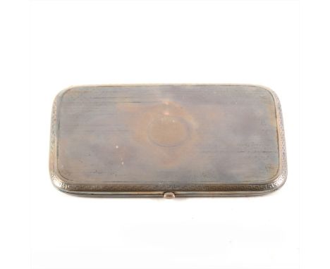 A large silver cigarette case, maker's mark rubbed, Birmingham 1918, engine turned decoration, with a key pattern outline, 7o