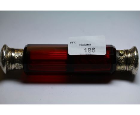 Victorian gilt metal double ended ruby glass scent bottle, slight dent to one cover, lacking internal stoppers