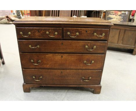 George III oak chest of drawers of small proportion, on bracket feet, 96cm x 48cm x 87cm high