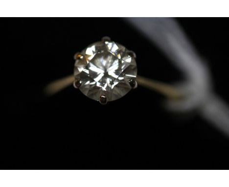 18ct gold mounted solitaire diamond ring, the round brilliant cut stone 1.4ct, ring size J/K, with accompanying Insurance val