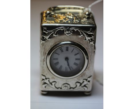 Edward VII embossed silver miniature carriage timepiece, the case by William Comyns, London 1903, with white enamel dial to t