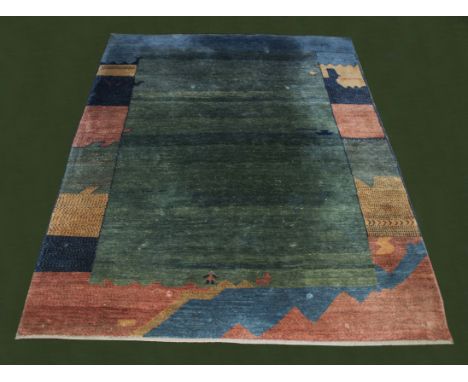 A large green ground wool carpet with ocean design, originally from Harrods of London, size 2.75m x 2m