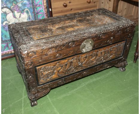 A Chinese carved wood trunk
