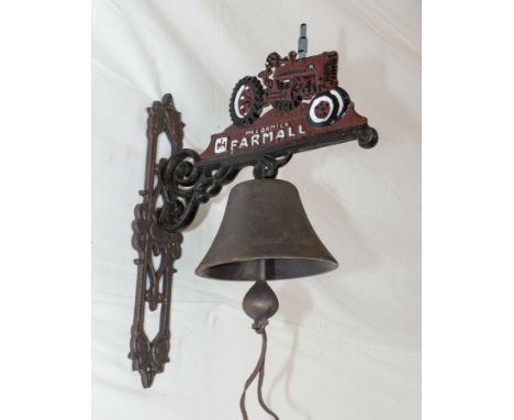 A cast Farmall tractor bell
