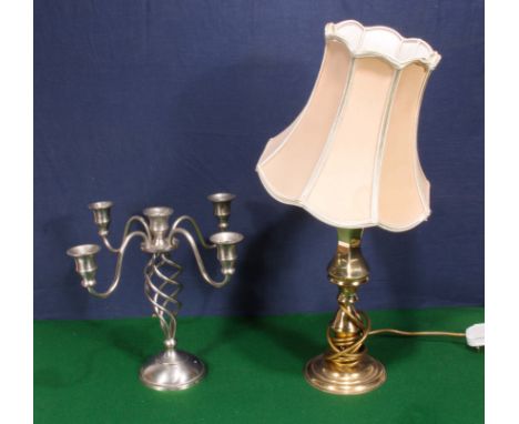 A table lamp and a candelabra