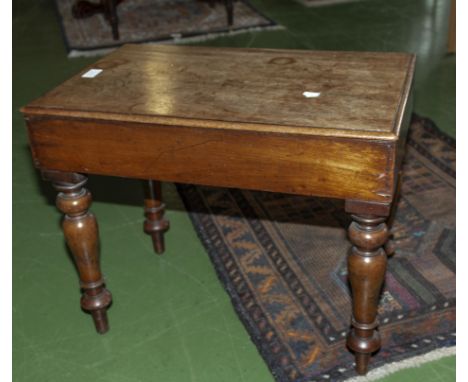 A mahogany commode
