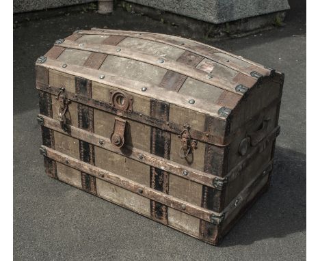 A dome top travel trunk