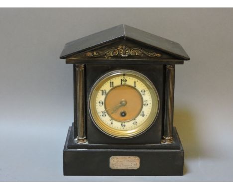 A Victorian black slate mantel clock, with presentation plaque inscribed 'Presented to The Rev G and Mrs Thomson, by the Choi