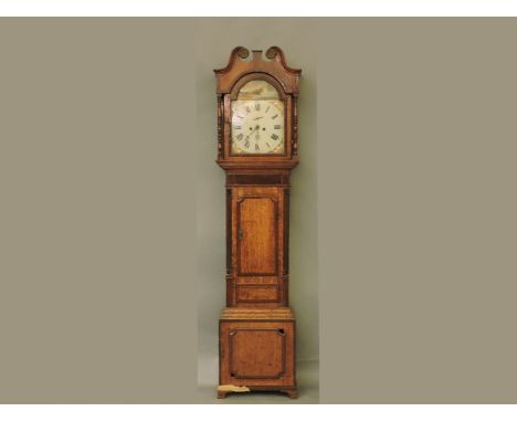 A 19th century mahogany and oak longcase clock, with arched painted dial, 221cm high