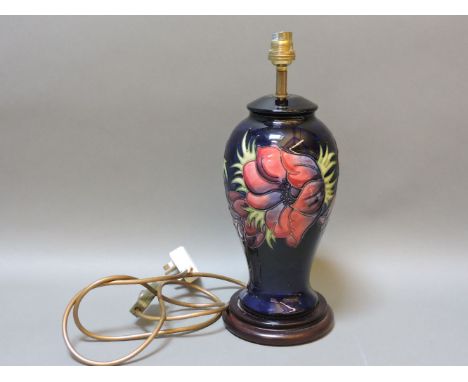 A Moorcroft lamp vase, 37cm high, navy clematis