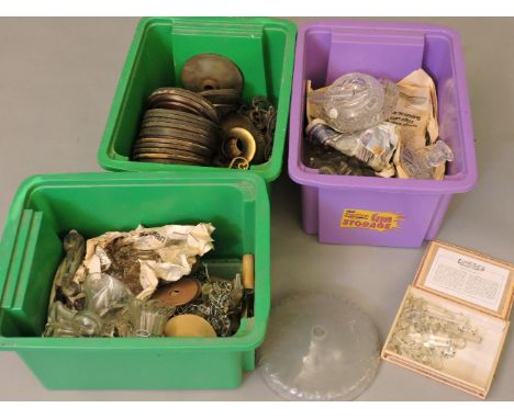 Three boxes of chandelier and lamp spares, lustre drops, chains, glass stoppers, etc