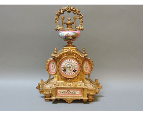 A French gilt metal and Paris porcelain mounted mantel clock, circa 1870s, chiming on a bell, the movement stamped for Japy F