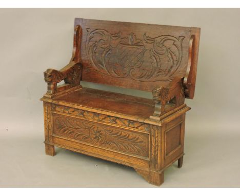 An oak carved monk's bench