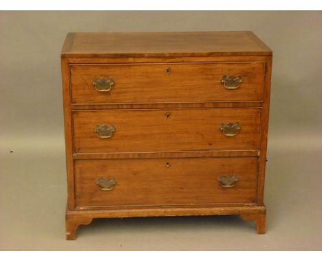 A mahogany three drawer chest, with a caddy top