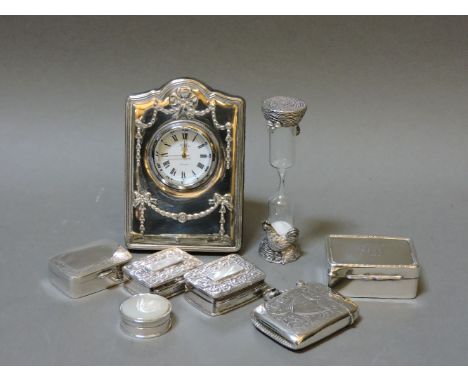 Five small silver boxes, vesta case, Birmingham 1907, small silver strut clock, locket, and 'chicken' egg timer