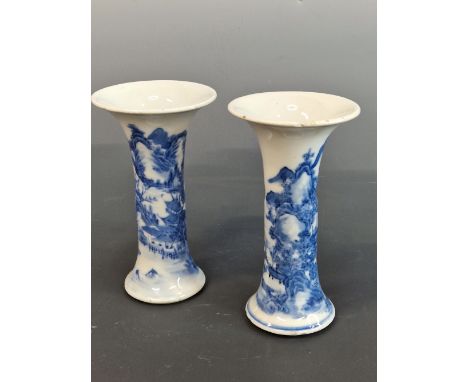 A PAIR OF CHINESE BLUE AND WHITE WAISTED CYLINDRICAL VASES PAINTED WITH MOUNTAINOUS LANDSCAPES, SEAL MARKS.   H 15cms.